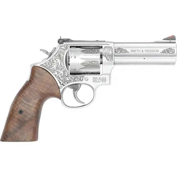 SMITH & WESSON 686 PLUS ENGRAVED STAINLESS 357MAG 4.13″ WALNUT GRIP, ADJ REAR, 7RD